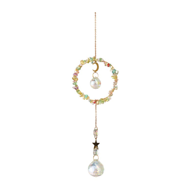Decorative hanging ornament with beads and crystals on a white background