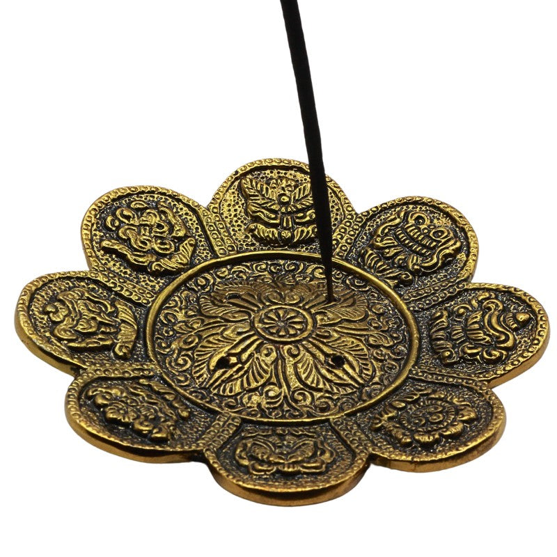 incense stick in a Gold coloured aluminium incense burner with 8 auspicious symbols
