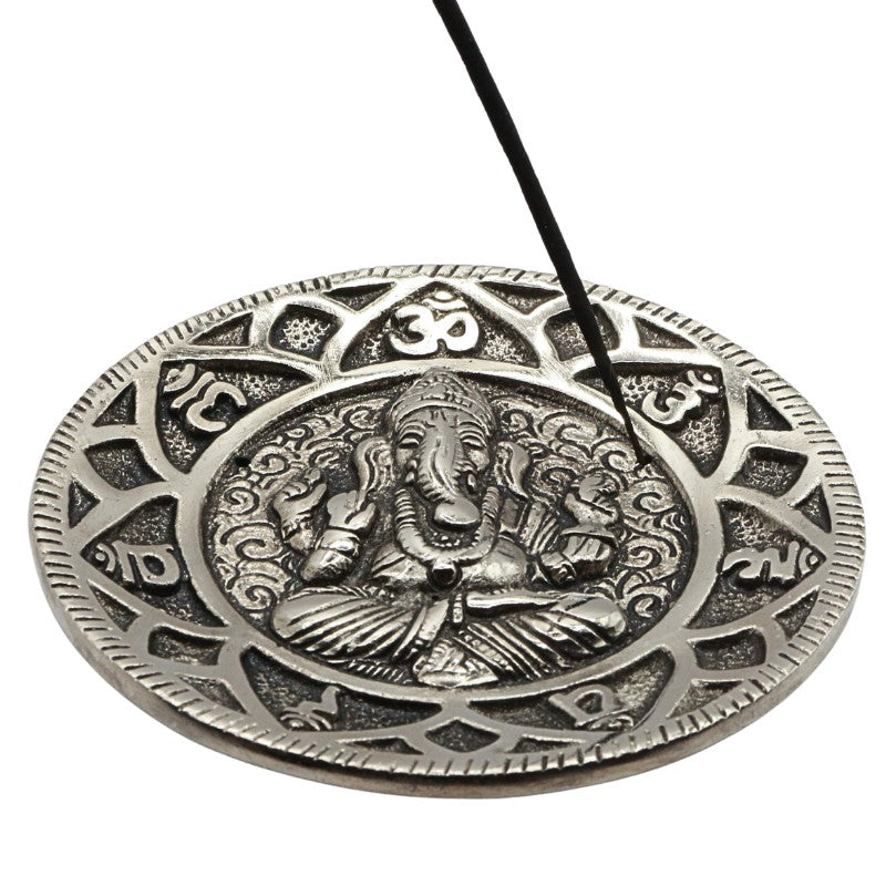 incense stick in aluminium incense burner with ganesh and chakras