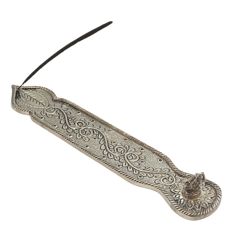 incense stick in an aluminium incense burner
