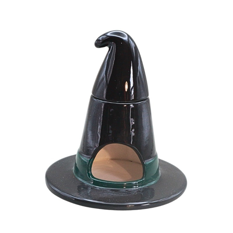 black ceramic witch hat oil burner on white background