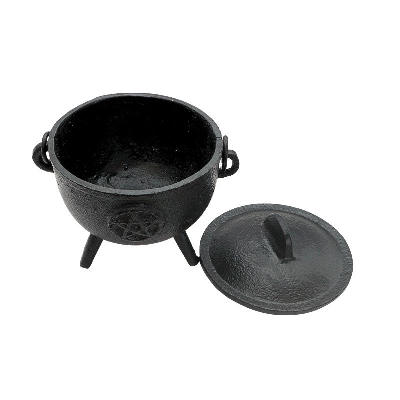 black cauldron with pentacle design on front