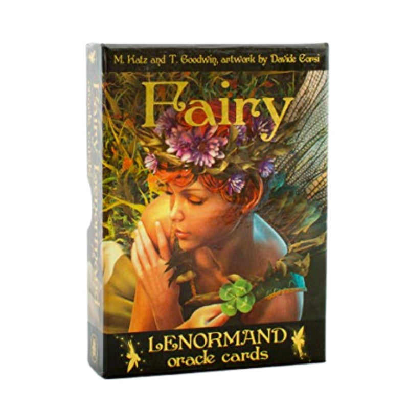Box of Fairy Lenormand oracle cards with a fairy holding flowers on a white background