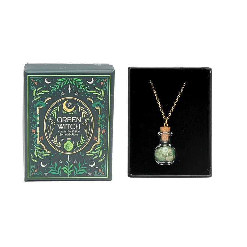 Green Witch necklace in a decorative box on a white background
