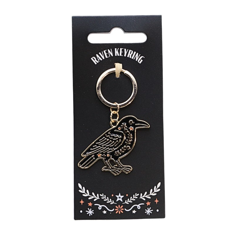 black raven keyring with gold chain on a black hangtag