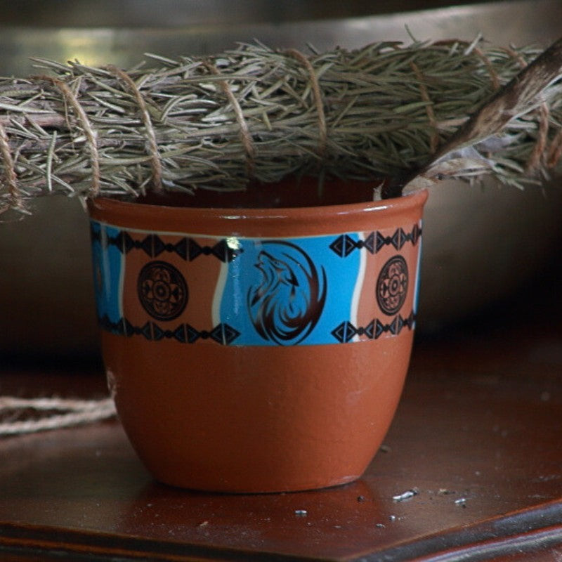 smudge bowl with wolf picture on front with rosemary smudge stick