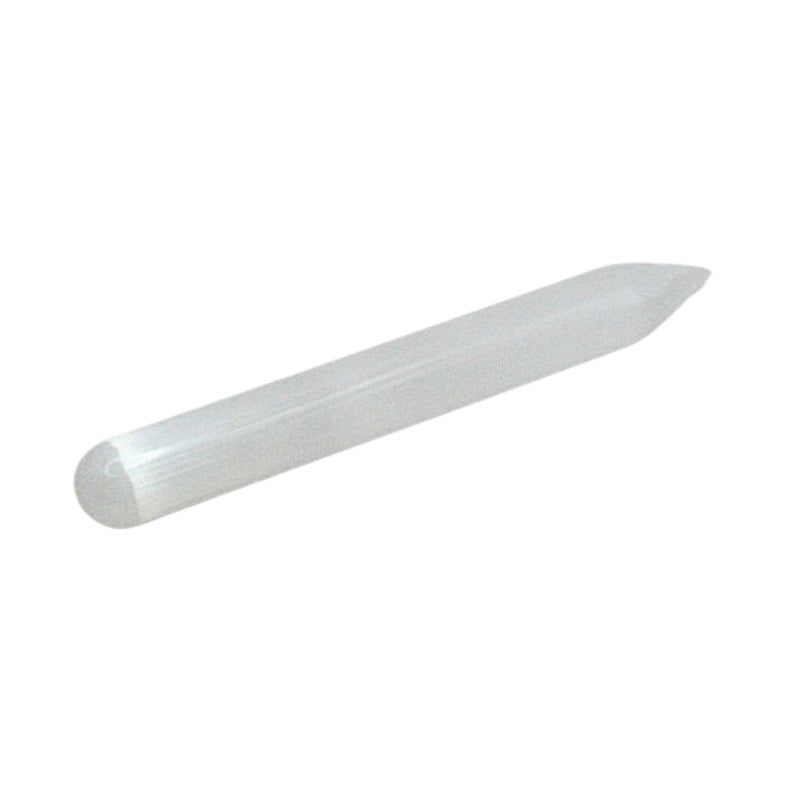 white selenite crystal wand on white background