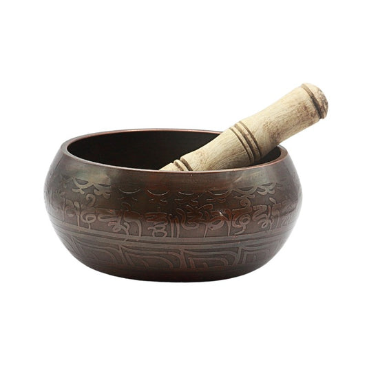 brass singing bowl with wooden striker