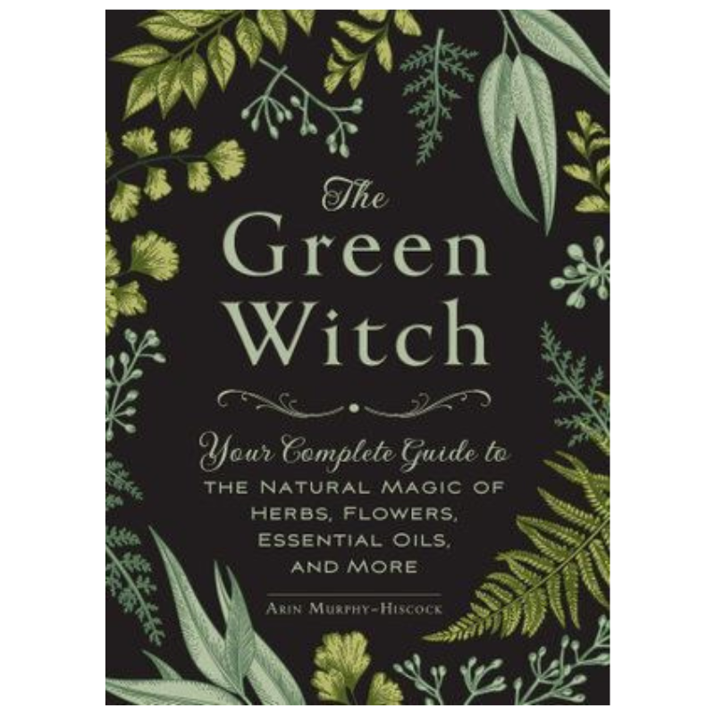 book cover of "The Green Witch" with illustrations of green leaves on a black background