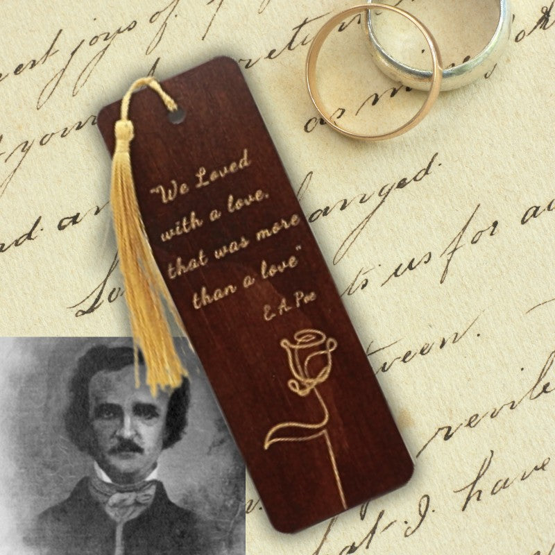 handmade bookmark on a love poem with wedding rings and picture of edgar allen poe