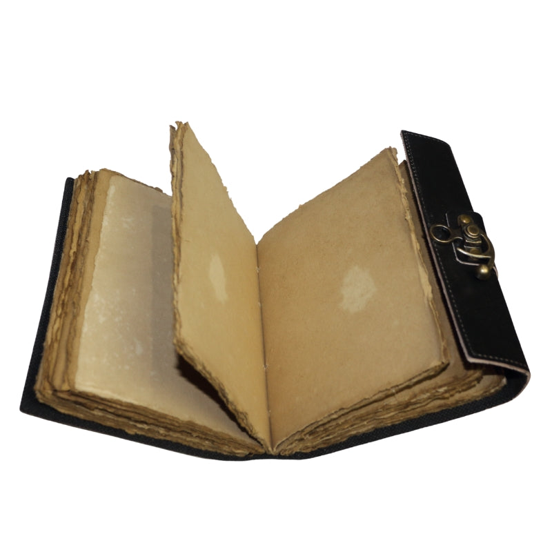 Antique style brown leather journal with the tree of life on the cover and a brass closure. Inside contains plain "antiqued" pages