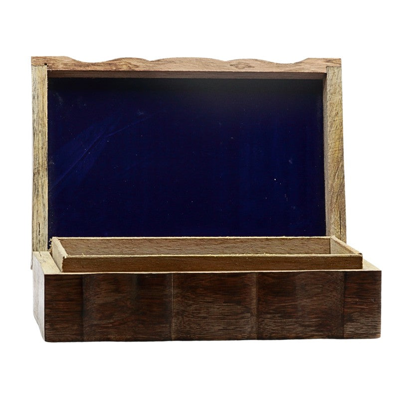 inside of a carved wooden box