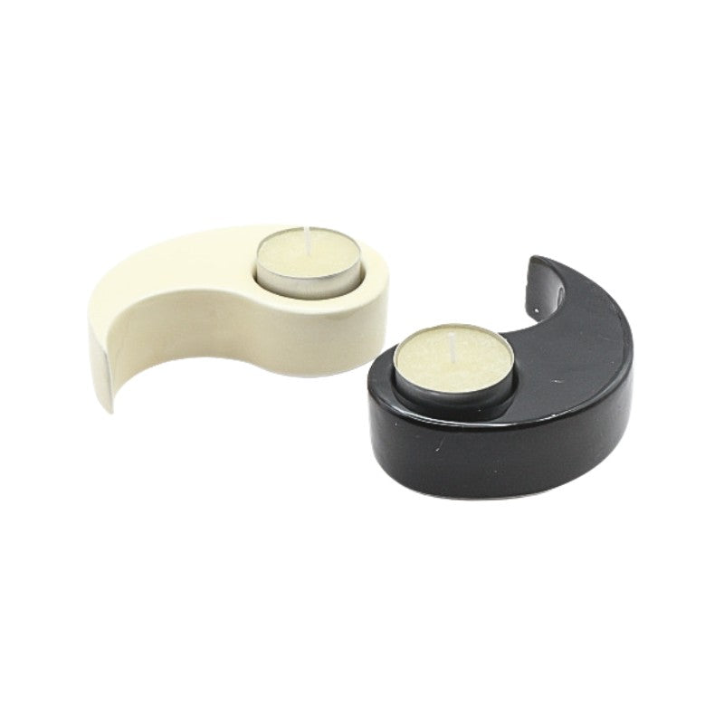 Black and beige yin yang candle holder on a white background