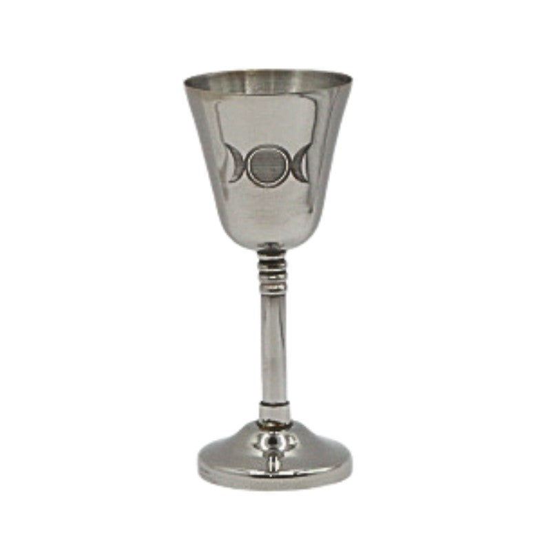 Silver goblet with a triple moon design on a white background