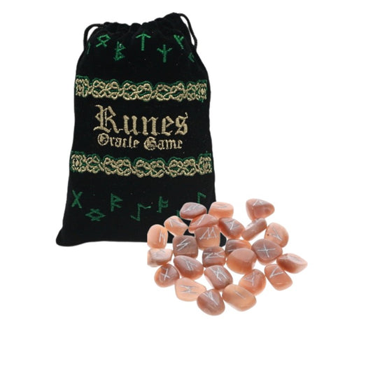 velvet rune pouch with peach moonstone runes laid out in front