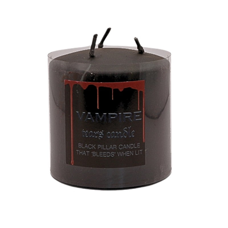 black pillar candle that bleeds red wax when lit