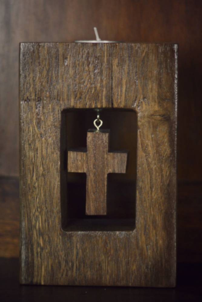 cross wooden tealight candle holder solid hardwood with white tea light in top on wooden background