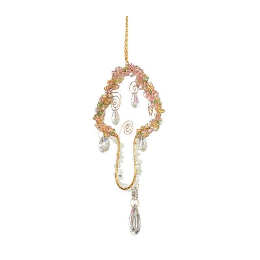 Decorative hanging ornament with multicolored beads and a mushroom shape on a white background