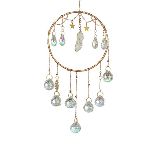 Decorative hanging ornament with crystal-like beads and gold accents on a white background
