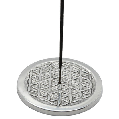 incense stick in a
 flower of life design aluminium incense burner