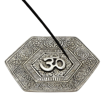 incense stick in an Om symbol hexagonal aluminium incense burner