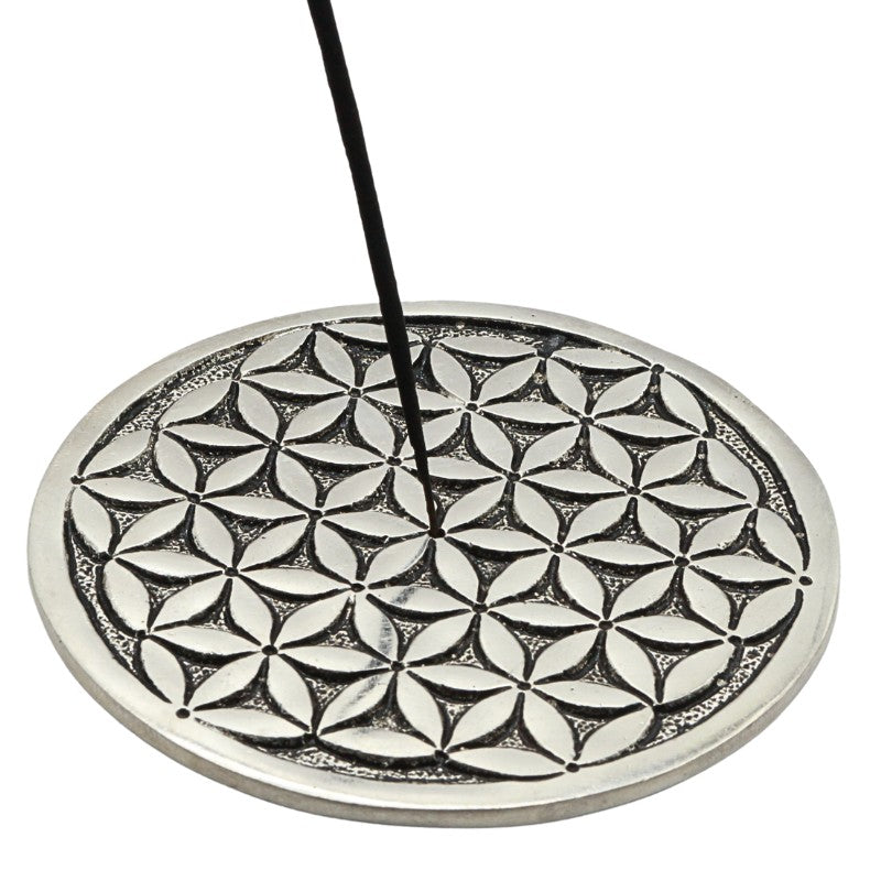 incense stick in a aluminium  flower of life incense burner 