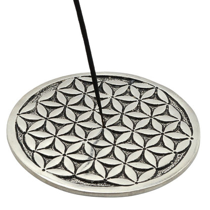incense stick in a aluminium  flower of life incense burner 
