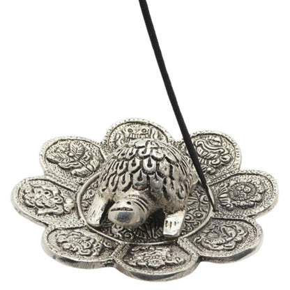 stick of incense in a turtle  aluminium incense burner 