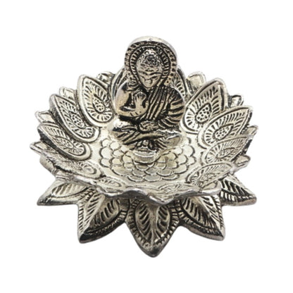 lotus shaped   aluminium incense burner with a buddha in the centre