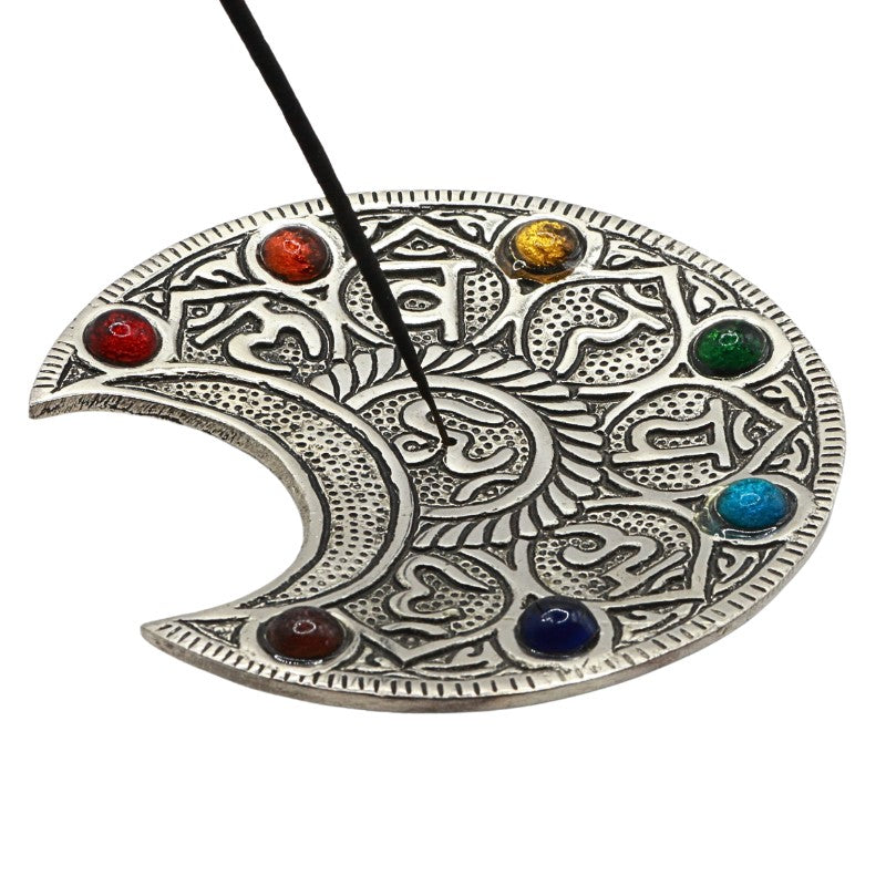 stick incense in an  aluminium incense burner 