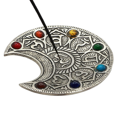 stick incense in an  aluminium incense burner 
