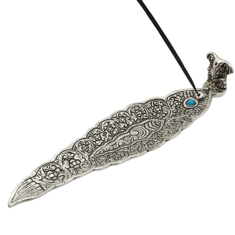incense stick in an Aluminium incense burner with elephant