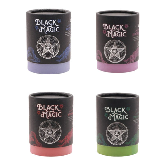 4 boxed candles from the brand black magic