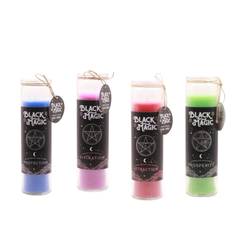 4 coloured candles in glass jars on a white background