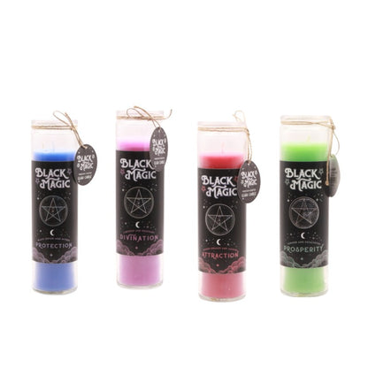 4 coloured candles in glass jars on a white background
