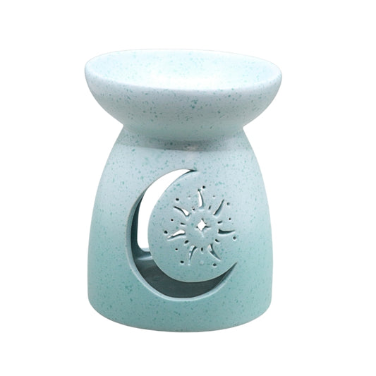 A light blue speckled ceramic oil burner candle holder with a crescent moon and star cutout on the front, shown against a plain white background.