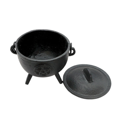 black cauldron with pentacle design on front