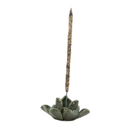 Ceramic Incense Stick Holder in the shape of a lotus holding an incense stick 