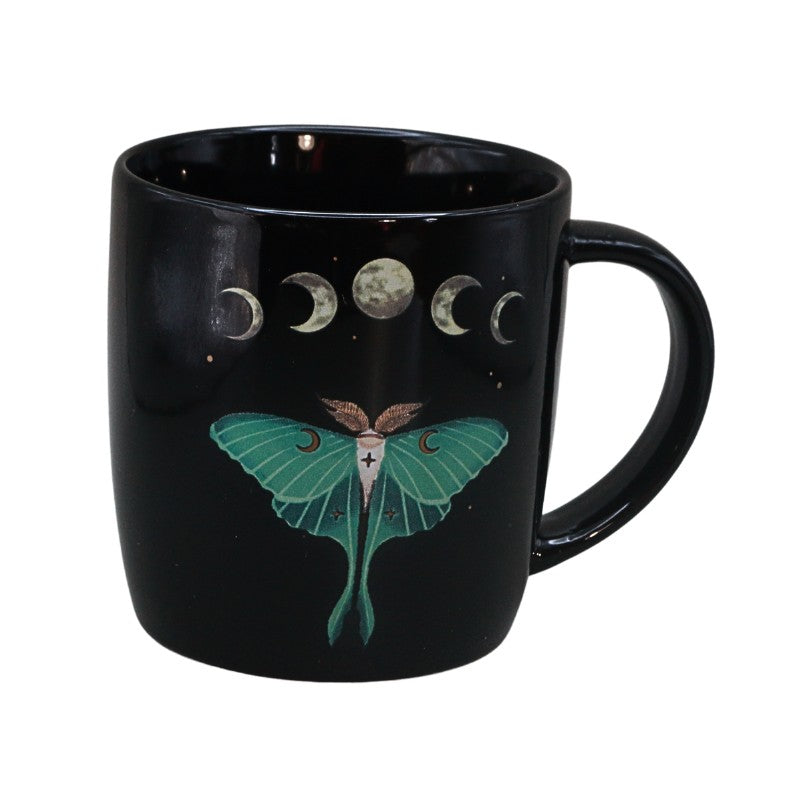 Black mug with Luna moth and moon phase design on white background