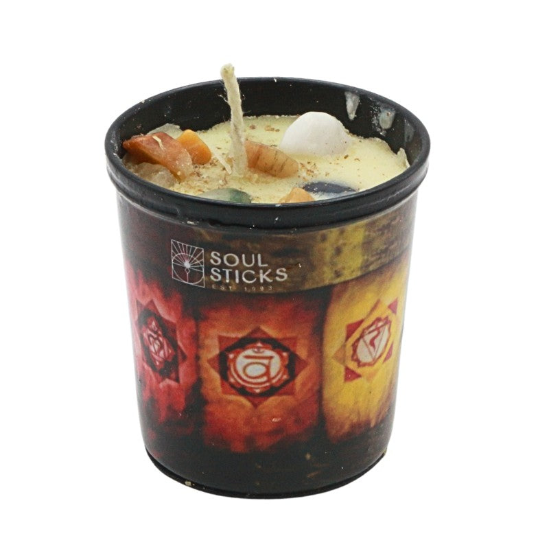 Candle in a container with 'Soul Sticks' branding on a white background