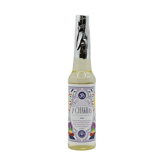 Bottle of 7 Chakras cleansing water on a white background