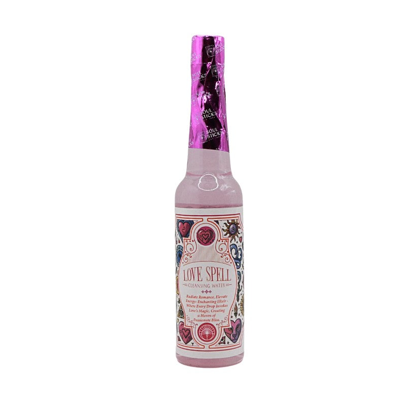 Bottle of 'Love Spell' with decorative label on a white background