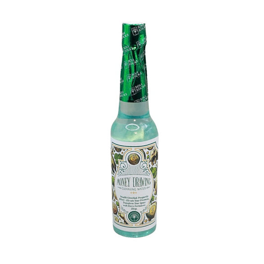 bottle of cleansing water with "money drawing" written on the labels and coins
