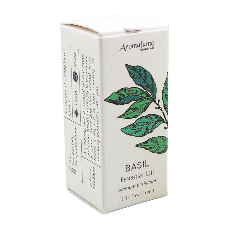 A box of Aromafume Naturals Basil Essential Oil, featuring a white carton with green leaf illustrations and black text.