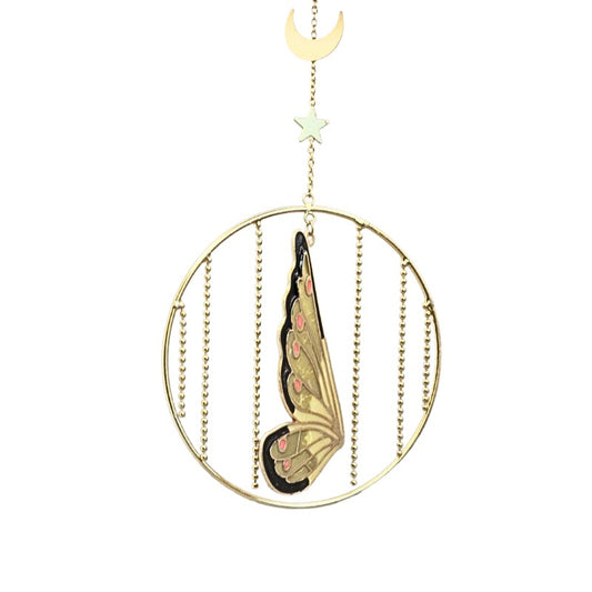 A gold-toned circular hanging ornament with vertical bead chains and a central butterfly motif, accented by a small star and crescent moon at the top, shown on a plain white background.