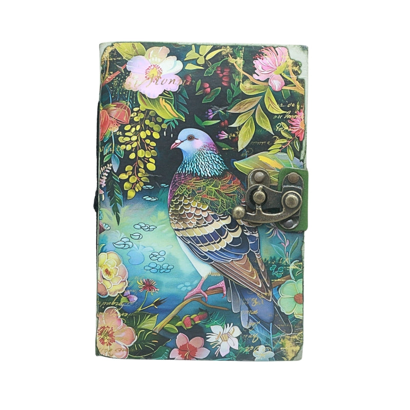front cover of journal with locking closure and an image of a bird and floral design, on a white background
