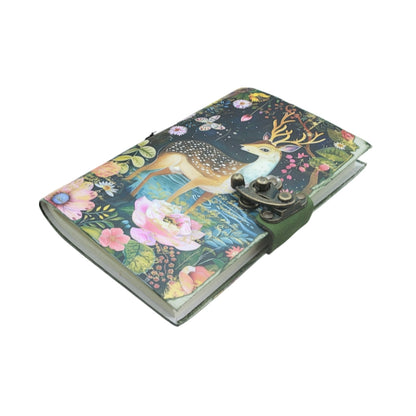 front cover of journal with locking closure and an image of a deer and floral design, on a white background
