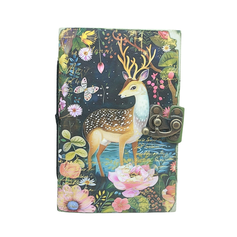 front cover of journal with locking closure and an image of a deer and floral design, on a white background