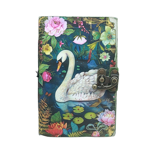 front cover of journal with locking closure and an image of a swan and floral design, on a white background