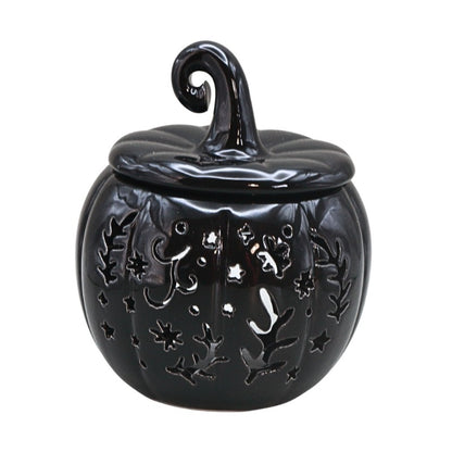 black pumpkin on white background
